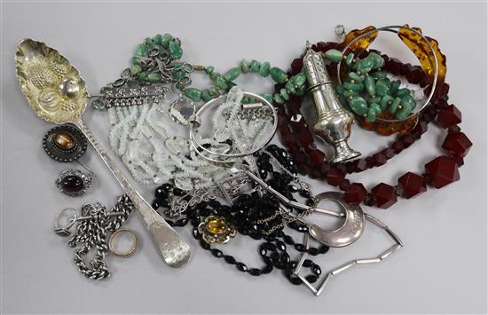 A silver berry spoon, a silver pepperette and a mixed quantity of assorted jewellery including silver and costume.